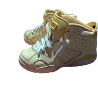 Gallery image 1 for Jordan 6 Retro Dynamic Yellow Floral Sneakers